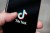 The TikTok logo is seen on an iPhone 11 Pro max