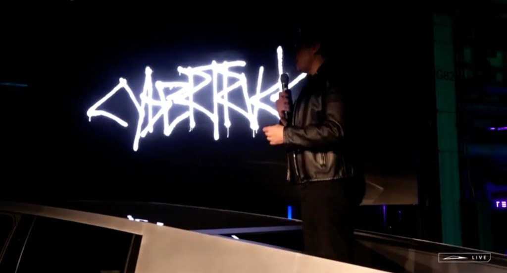 Elon Musk presents at the Cybertruck delivery event